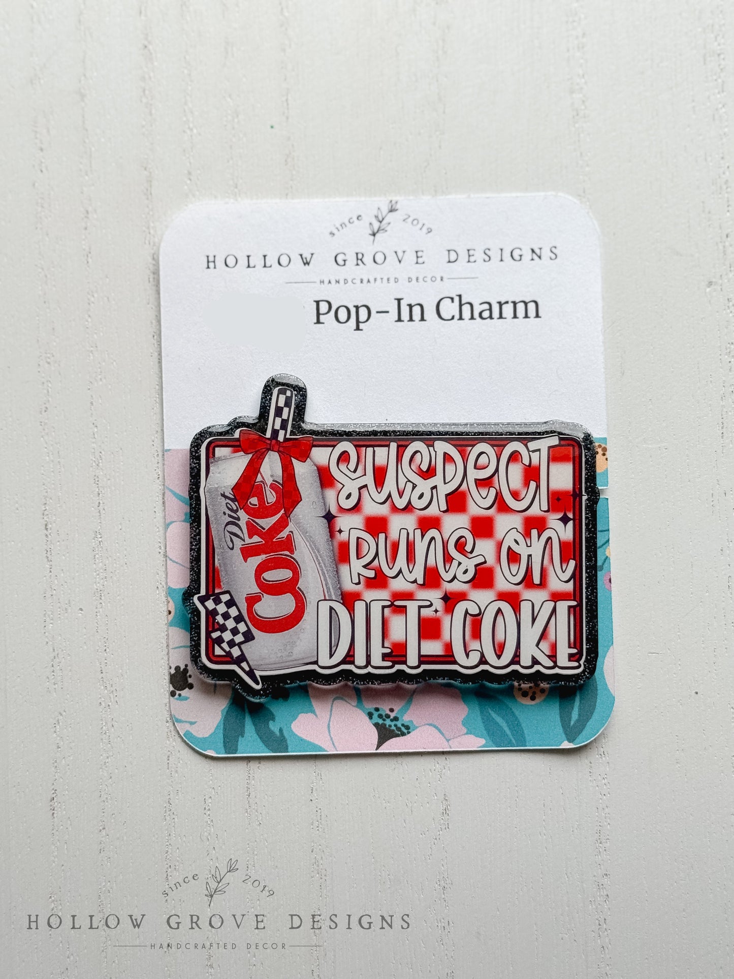 Suspect Runs on Diet Coke Pop-in Charm